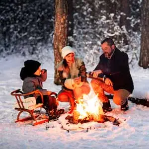 Selecting the best campsite takes some time and thought, like This family enjoying a winter camp out!