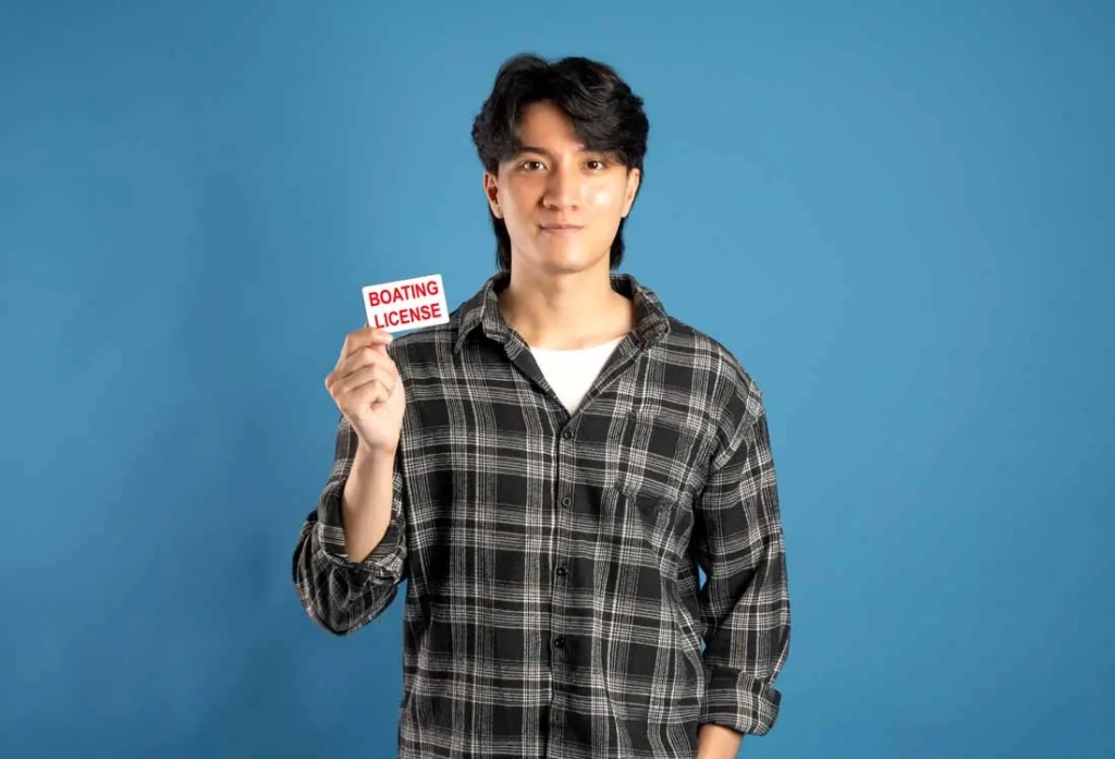 Boating License vecteezy_portrait-of-asian-male-student-posing-on-blue-background_51216625