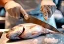 vecteezy_a-chef-meticulously-filleting-a-whole-fish-showcasing-their_44649599