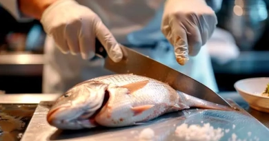 vecteezy_a-chef-meticulously-filleting-a-whole-fish-showcasing-their_44649599