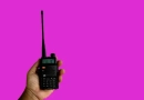 vecteezy_a-portable-radio-transmitter-holding-in-hand-blurred-an_13945584