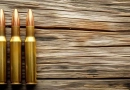 vecteezy_ai-generated-a-rifle-and-a-carbine-ammo-close-up_38482560