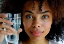 vecteezy_ai-generated-close-up-young-woman-drinking-water-woman_39159760