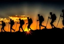 vecteezy_ai-generated-silhouette-of-hikers-trekking-in-mountains_36777838
