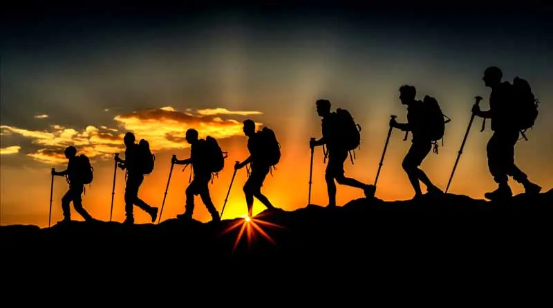 vecteezy_ai-generated-silhouette-of-hikers-trekking-in-mountains_36777838