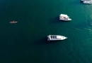 vecteezy_boats-on-blue-water-drone-shot_28883262