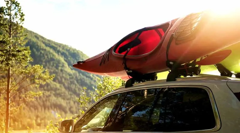 vecteezy_car-road-trip-with-kayak_24519212