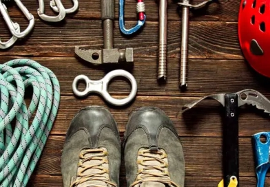 vecteezy_climbing-equipment-on-dark-wooden-background-top-view_3514643