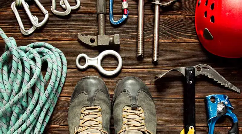 vecteezy_climbing-equipment-on-dark-wooden-background-top-view_3514643