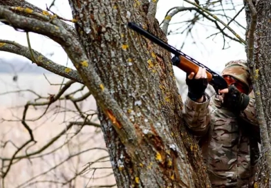 vecteezy_hunting-permit-man-brutal-gamekeeper-nature-background_43279298