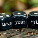 vecteezy_manage-your-risk-three-black-dices-on-a-white-background_46004612