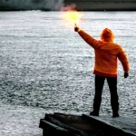 vecteezy_the-sos-signal-a-yellow-figure-with-a-signal-light_23826895