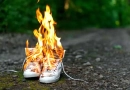 What Are Some Common Mistakes People Make In Survival Situations? vecteezy_used-white-high-sneakers-burning-on-a-rural-road-that-runs_41506153