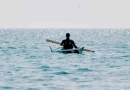 vecteezy_woman-sea-kayak-happy-smiling-woman-in-kayak-on-ocean_45598333