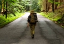 Should You Have A Bug-Out Bag, And What Should It Include? vecteezy_young-woman-hiker-walking-on-narrow-road-through-summer_7665864