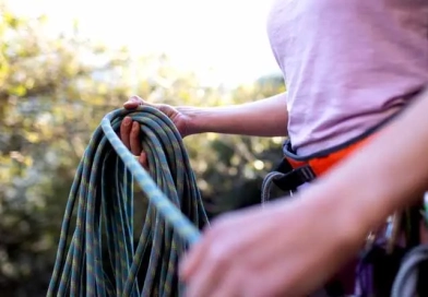 How to Maintain Your Hiking Gear vecteezy_a-rock-climber-coils-a-rope_9803739