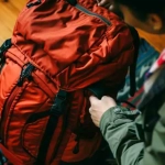 vecteezy_ai-generated-tourist-packing-backpack-for-travelling_39099440