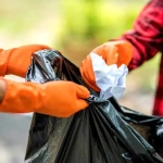 vecteezy_men-and-women-help-each-other-to-collect-garbage_4837960