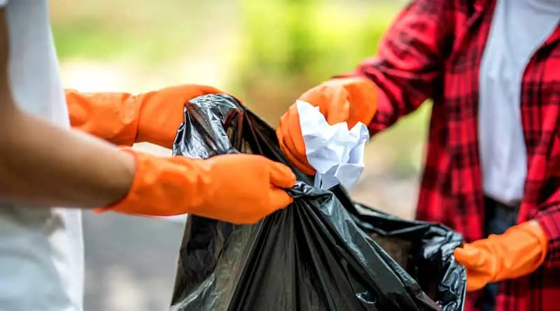 vecteezy_men-and-women-help-each-other-to-collect-garbage_4837960