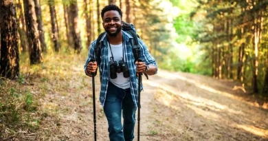 vecteezy_young-man-enjoys-hiking-in-nature_46921140