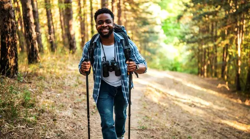 vecteezy_young-man-enjoys-hiking-in-nature_46921140