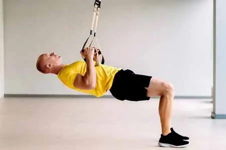 dead hang vecteezy_a-focused-male-athlete-performing-an-exercise-on-functional_50656137